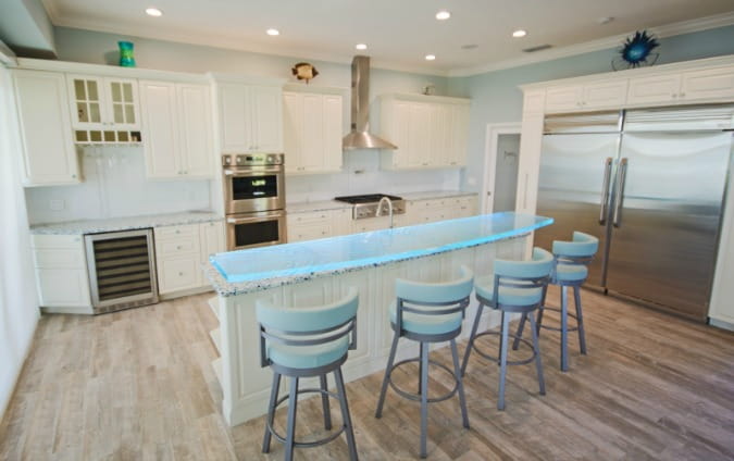 https://www.countertopspecialty.com/images/glass-countertops-translucent-green-bartop-kitchen-island-675-min.jpg?ezimgfmt=rs:392x246/rscb45/ngcb45/notWebP